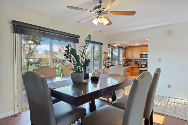 a view of a dining room with furniture window and outside view
