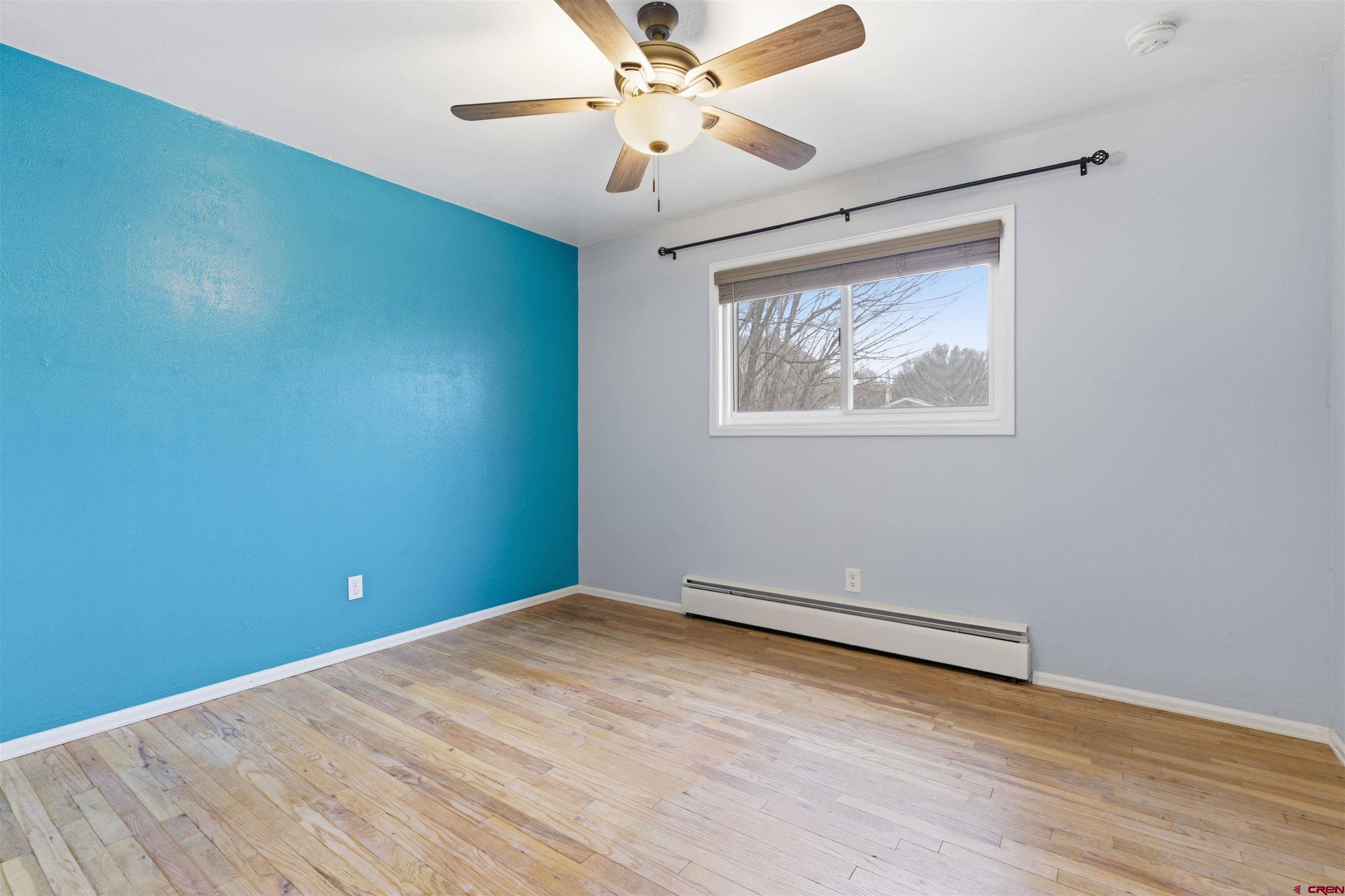 1029 Howard Street Delta, CO 81416 - Photo 7 of 17 a view of an empty room with a window