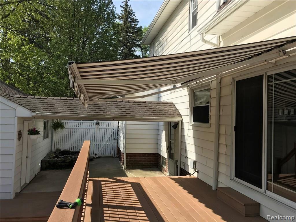 35804 John R Street Wayne, MI 48184 - Photo 53 of 80 TREX decking is maintenance free with 2 Mary Grove Retractable Awnings!