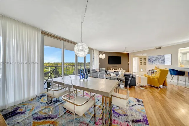 a very nice looking living room with furniture and a flat screen tv