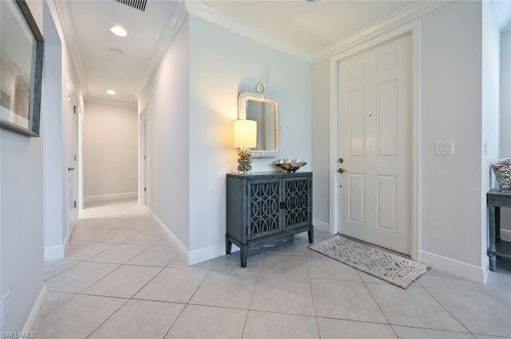 6934 Avalon Circle, Unit 401 Naples, FL 34112 - Photo 8 of 13 a view of a hallway and entryway