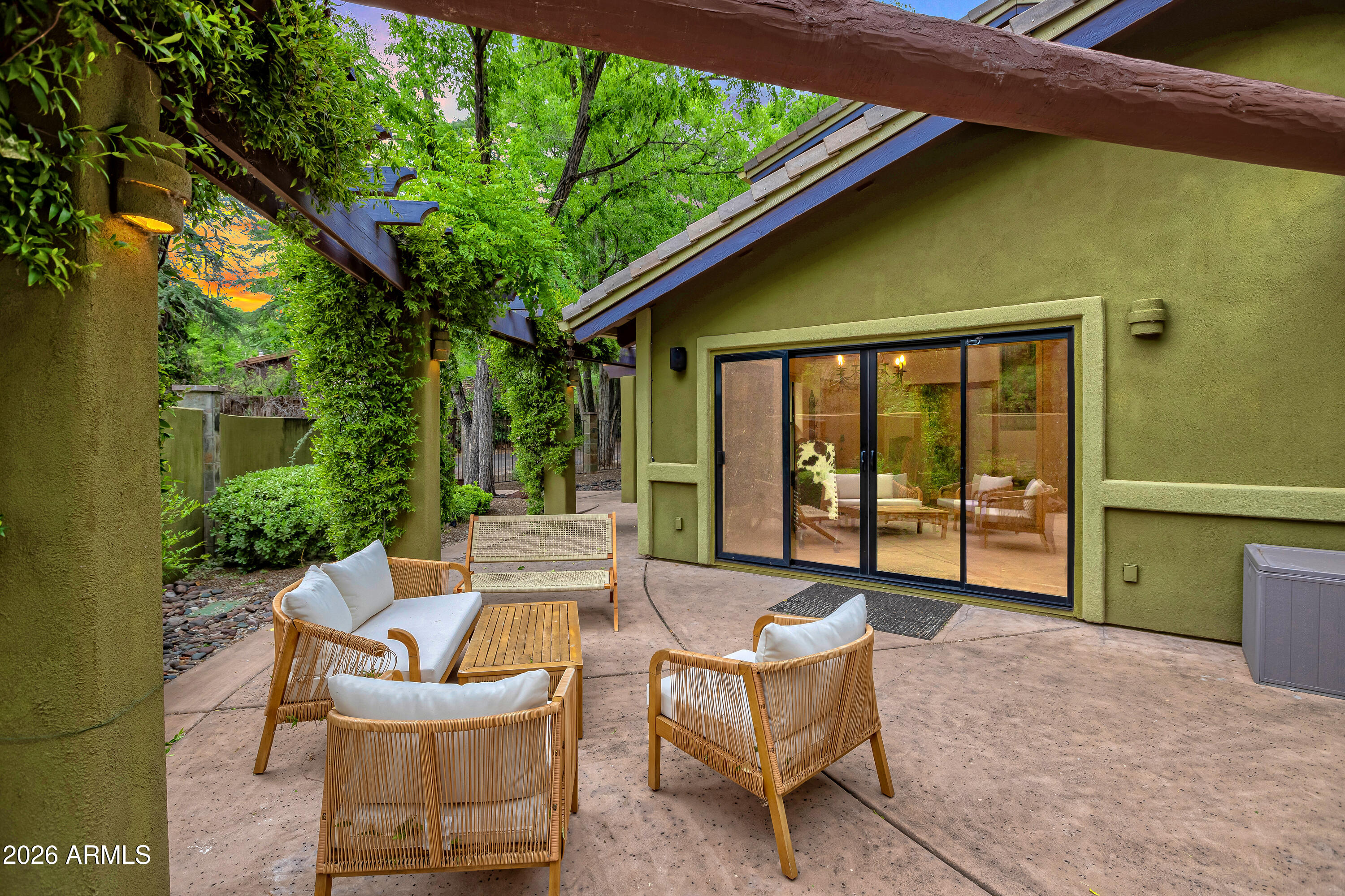 55 Ranch House Circle Sedona, AZ 86336 - Photo 59 of 61 a view of a patio with a table chairs and a backyard