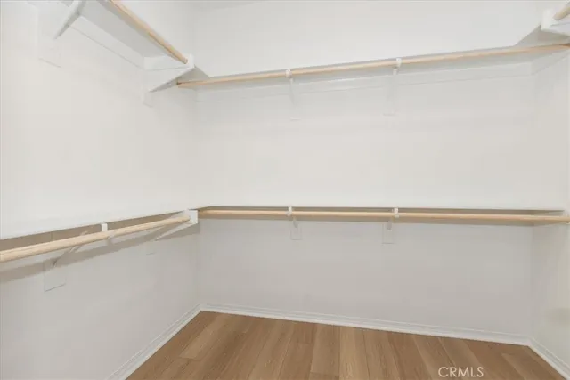 a view of a room with racks on the wall