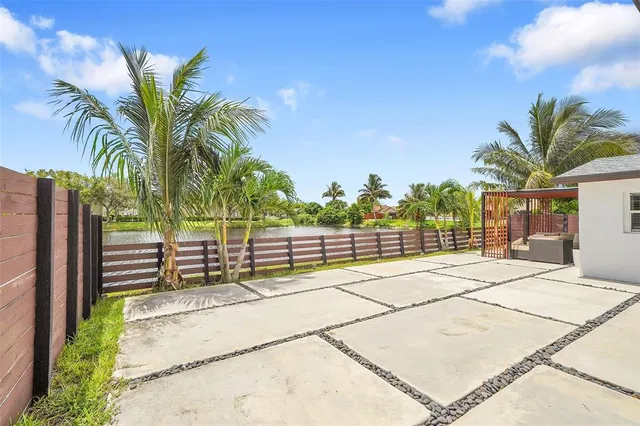 a view of a yard with a patio