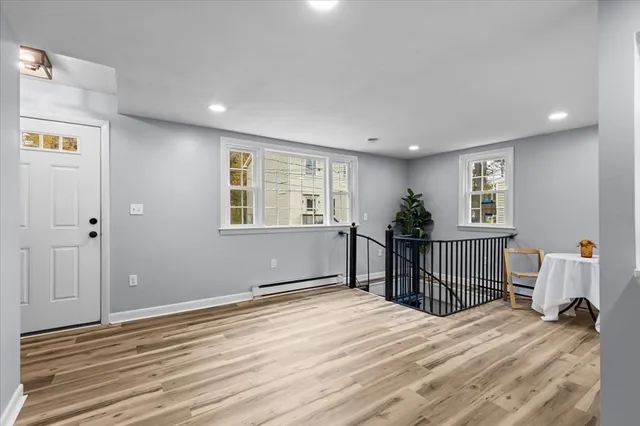 a bedroom with a bed and a table in it