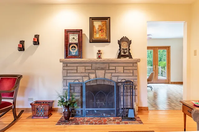 a kitchen with a dining table chairs and large window