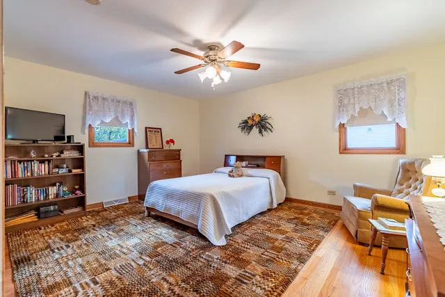 a bath tub sitting next to a window