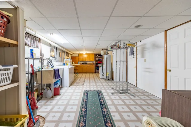 a view of a house with a yard porch and sitting area