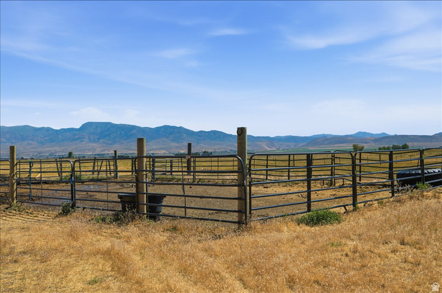 1634 West Arimo Road Arimo, ID 83214 - Photo 58 of 89 Enclosed paddock area featuring metal fencing, wood posts, and a metal gate
