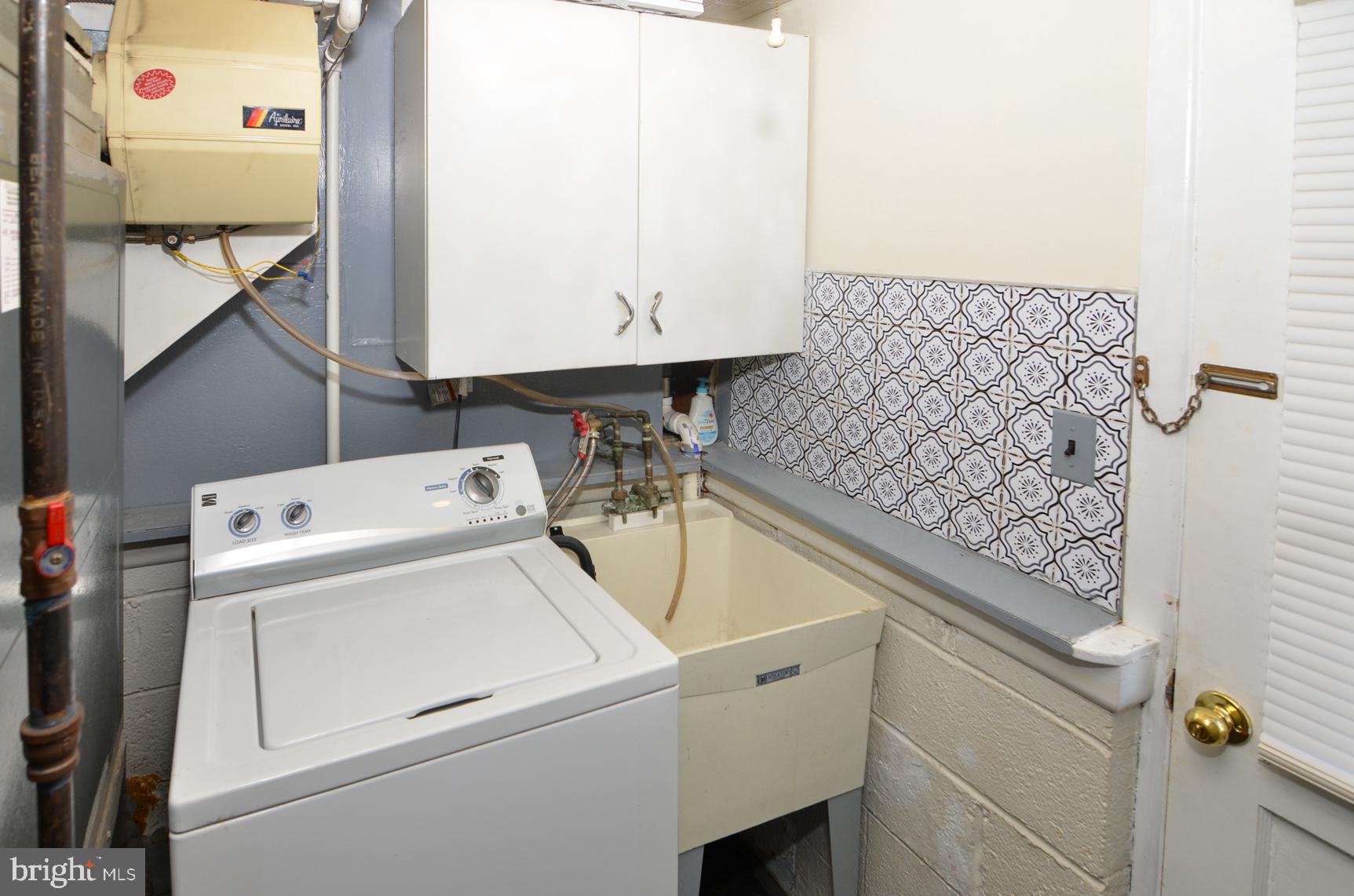 108 Winding Way Hamilton, NJ 08620 - Photo 23 of 29 a utility room with dryer and washer