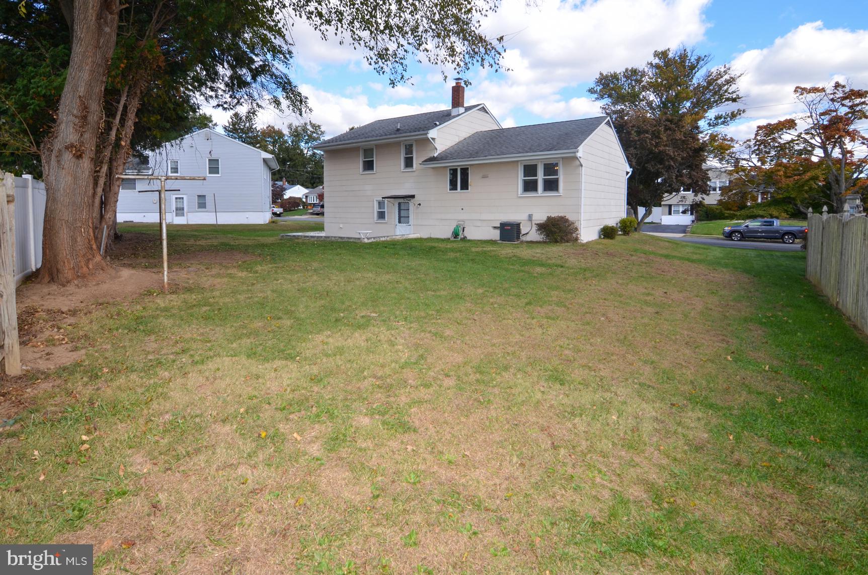 108 Winding Way Hamilton, NJ 08620 - Photo 5 of 29 a front view of a house with a yard