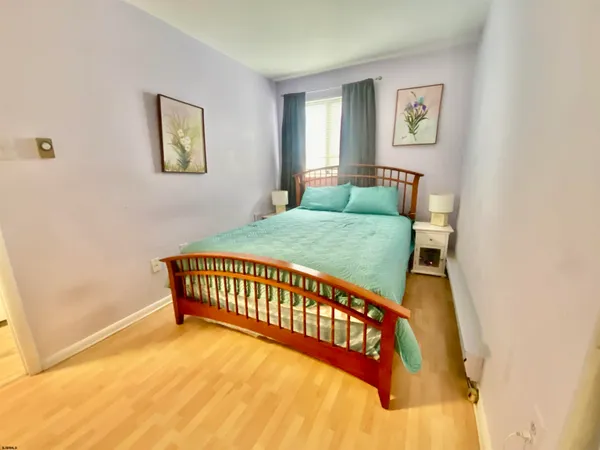 a bathroom with a toilet and a shower curtain