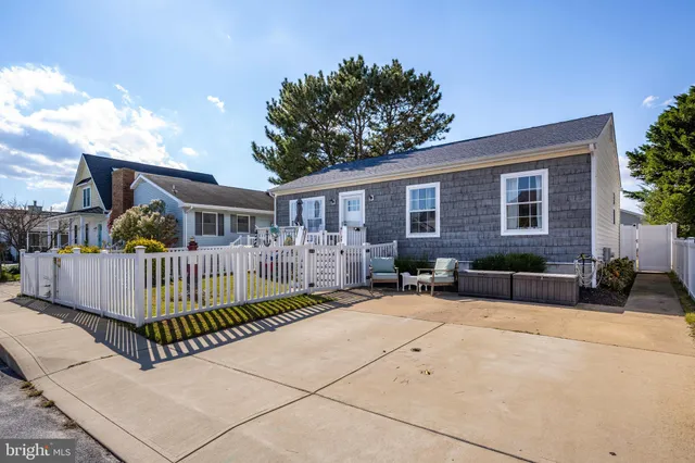 a view of house with a patio outdoor seating space