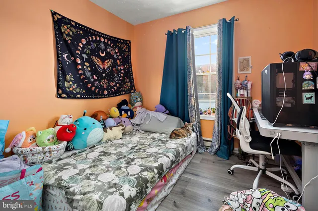 a view of a hallway with washer and dryer