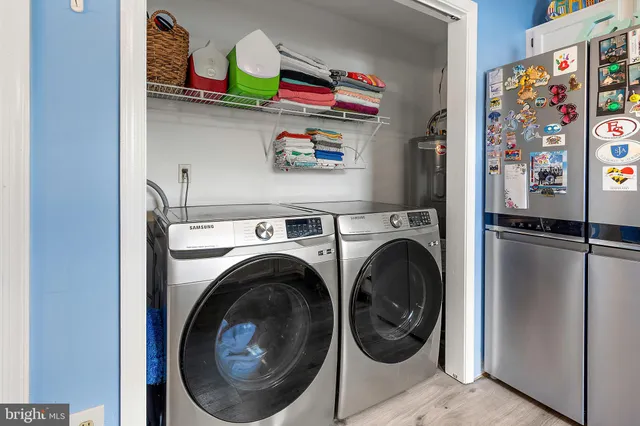 a view of a chair and tables in the balcony