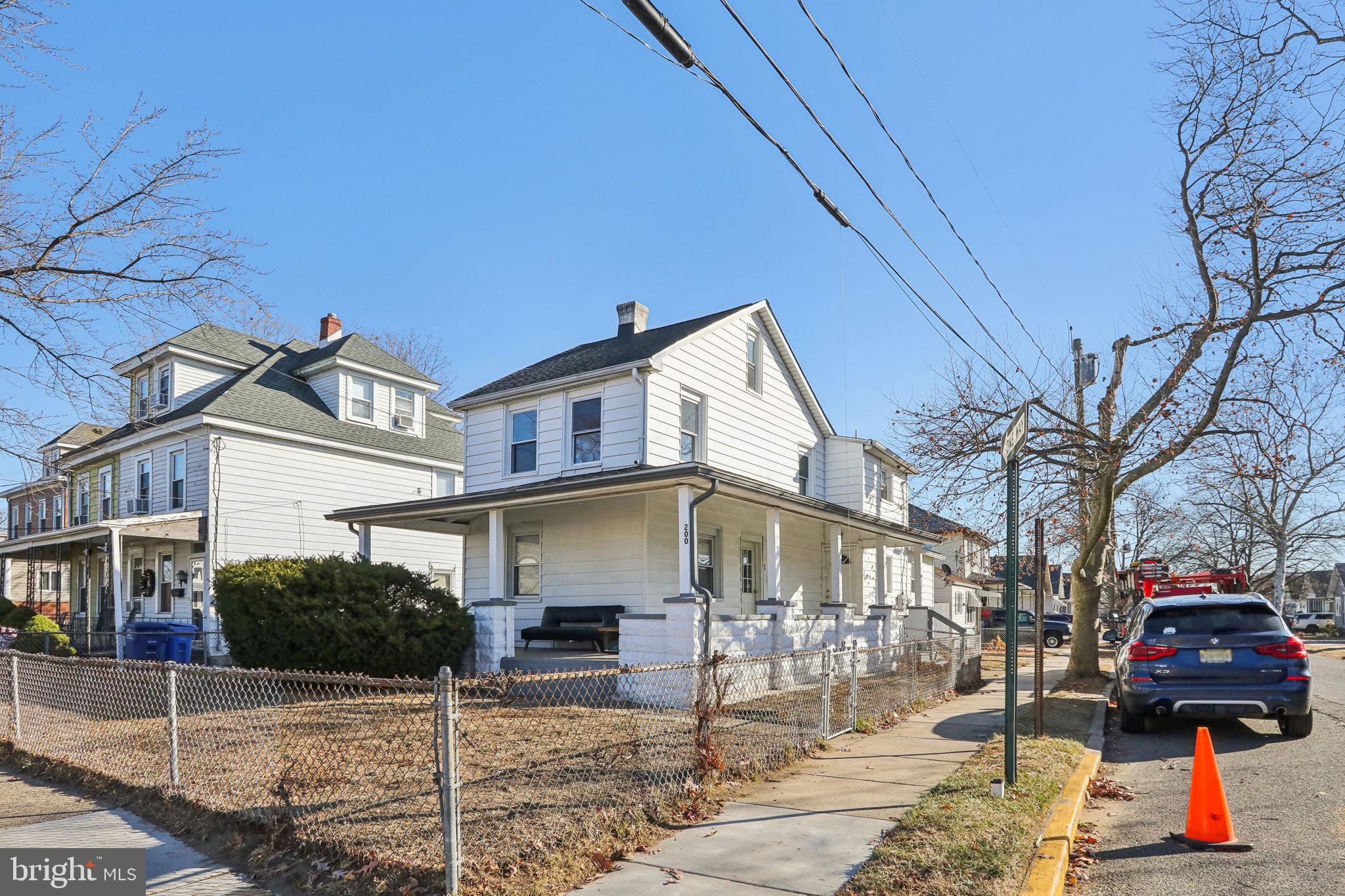 200 East Washington Street Riverside, NJ 08075 - Photo 3 of 31 a front view of a house with parking space