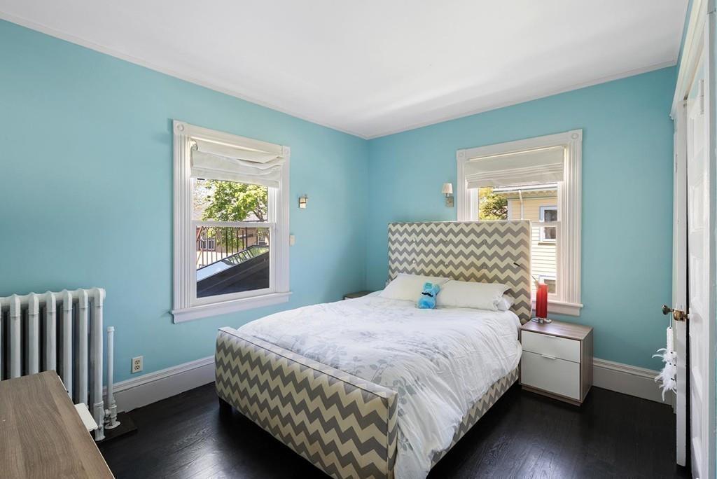 114 Naples Road Brookline, MA 02446 - Photo 16 of 24 a bedroom with a bed and a window