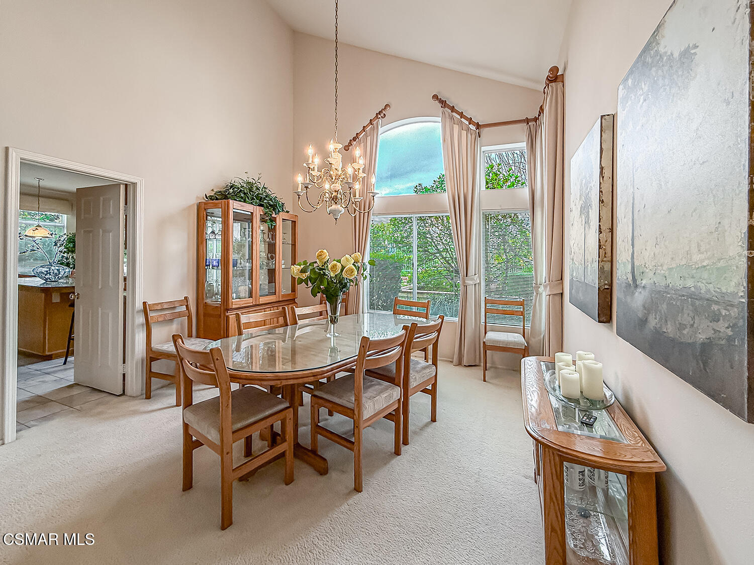 260 Sycamore Ridge Street Simi Valley, CA 93065 - Photo 15 of 59 a dining room with furniture a chandelier and fireplace