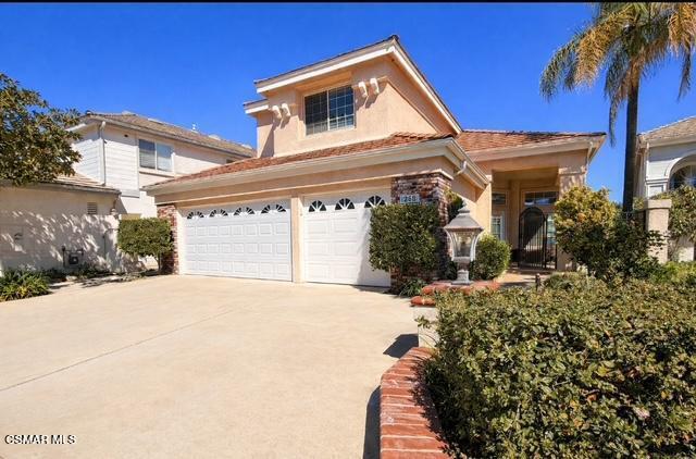260 Sycamore Ridge Street Simi Valley, CA 93065 - Photo 2 of 59 front view of a house with a yard