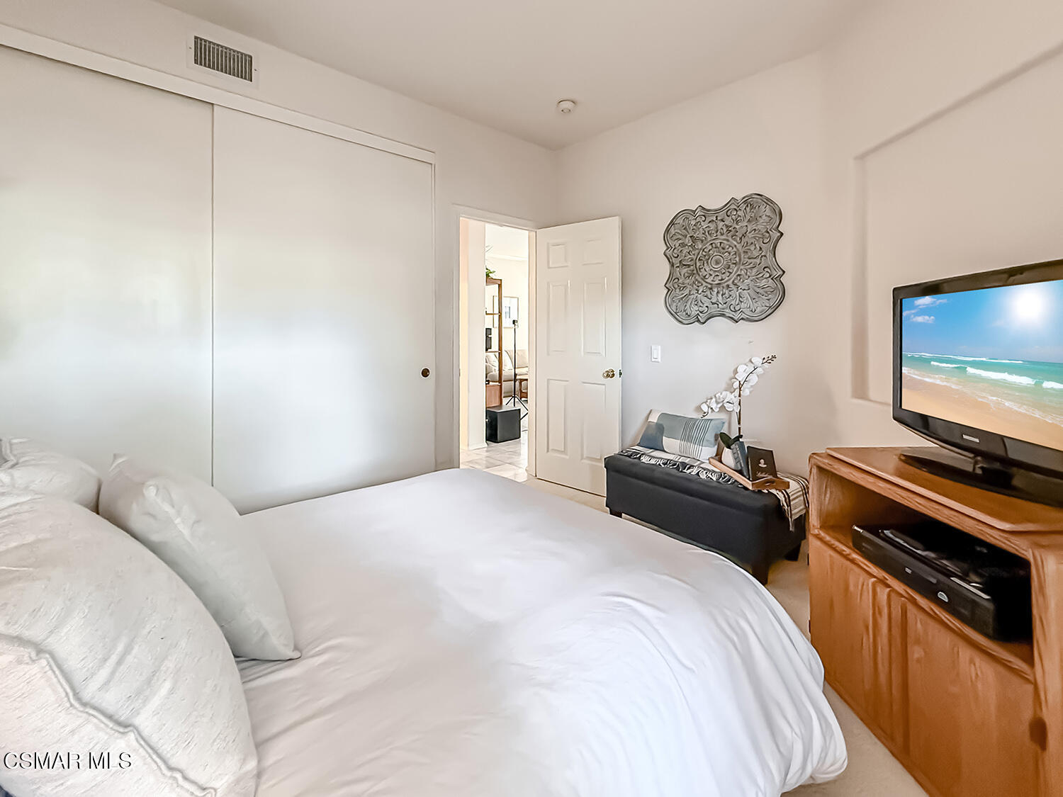 260 Sycamore Ridge Street Simi Valley, CA 93065 - Photo 29 of 59 a bedroom with a bed and a flat screen tv
