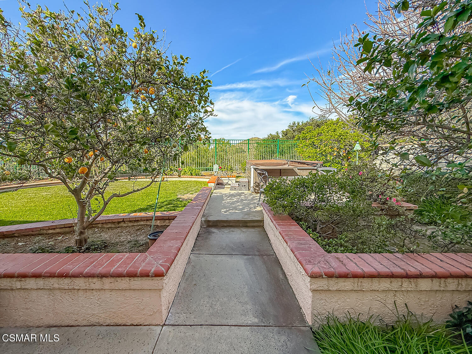 260 Sycamore Ridge Street Simi Valley, CA 93065 - Photo 54 of 59 a view of a pathway with a wrought fence