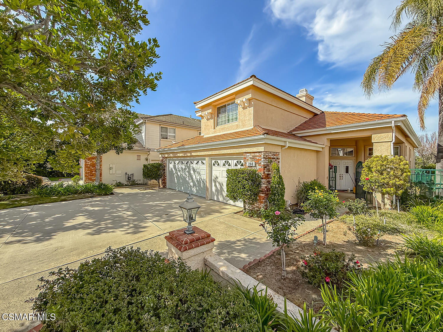 260 Sycamore Ridge Street Simi Valley, CA 93065 - Photo 9 of 59 a front view of a house with a yard