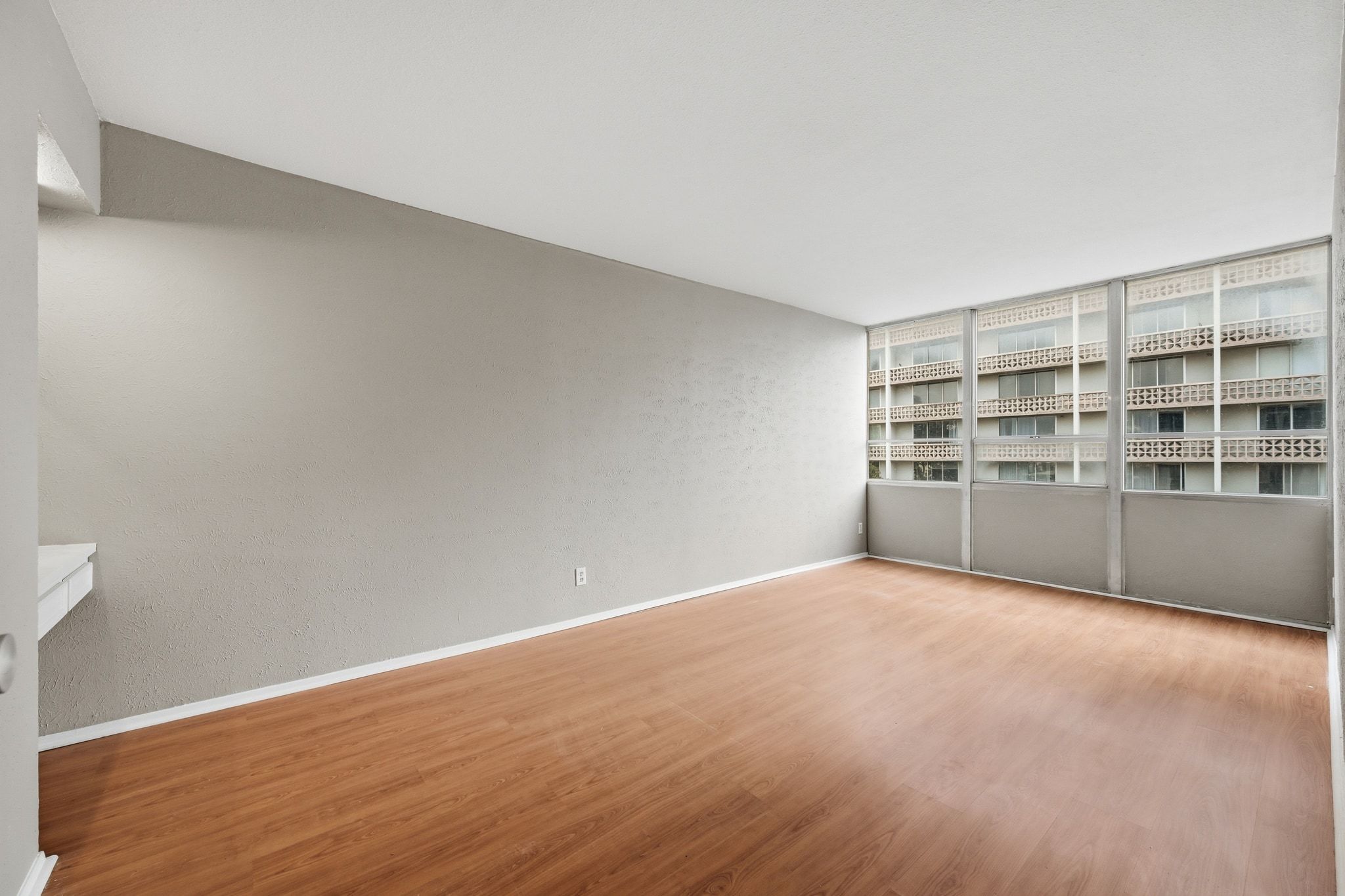 1800 Lavaca Street, Unit 515 Austin, TX 78701 - Photo 1 of 20 a view of an empty room with a window