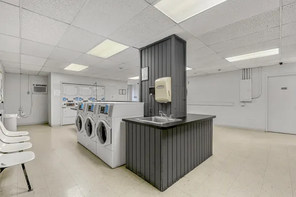 a view of kitchen sink washer and dryer