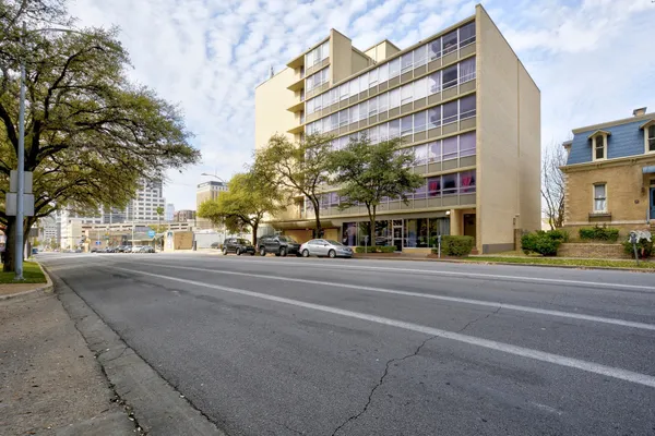 a view of a building and a street