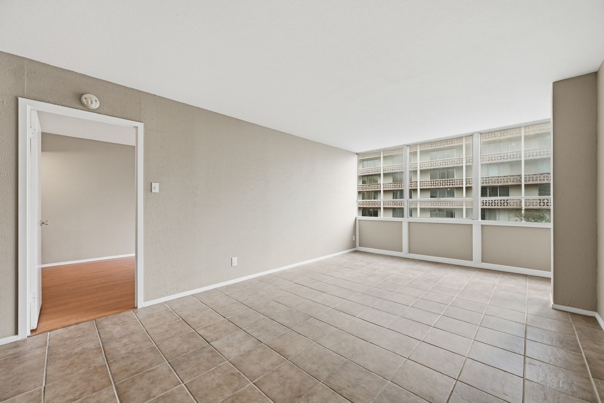 1800 Lavaca Street, Unit 515 Austin, TX 78701 - Photo 3 of 20 a view of an empty room with a window