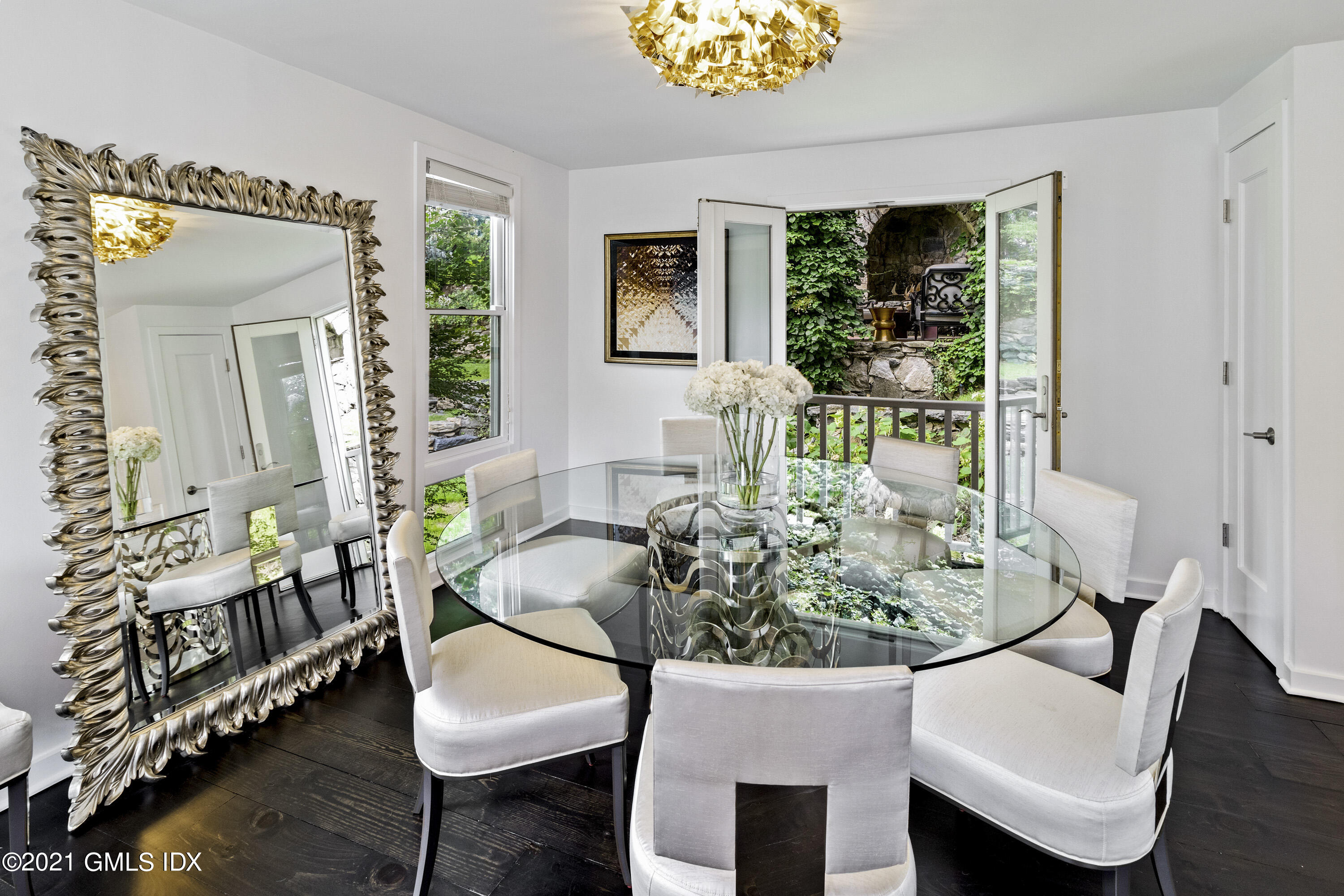 316 Valley Road Cos Cob, CT 06807 - Photo 11 of 25 a living room with furniture and a potted plant