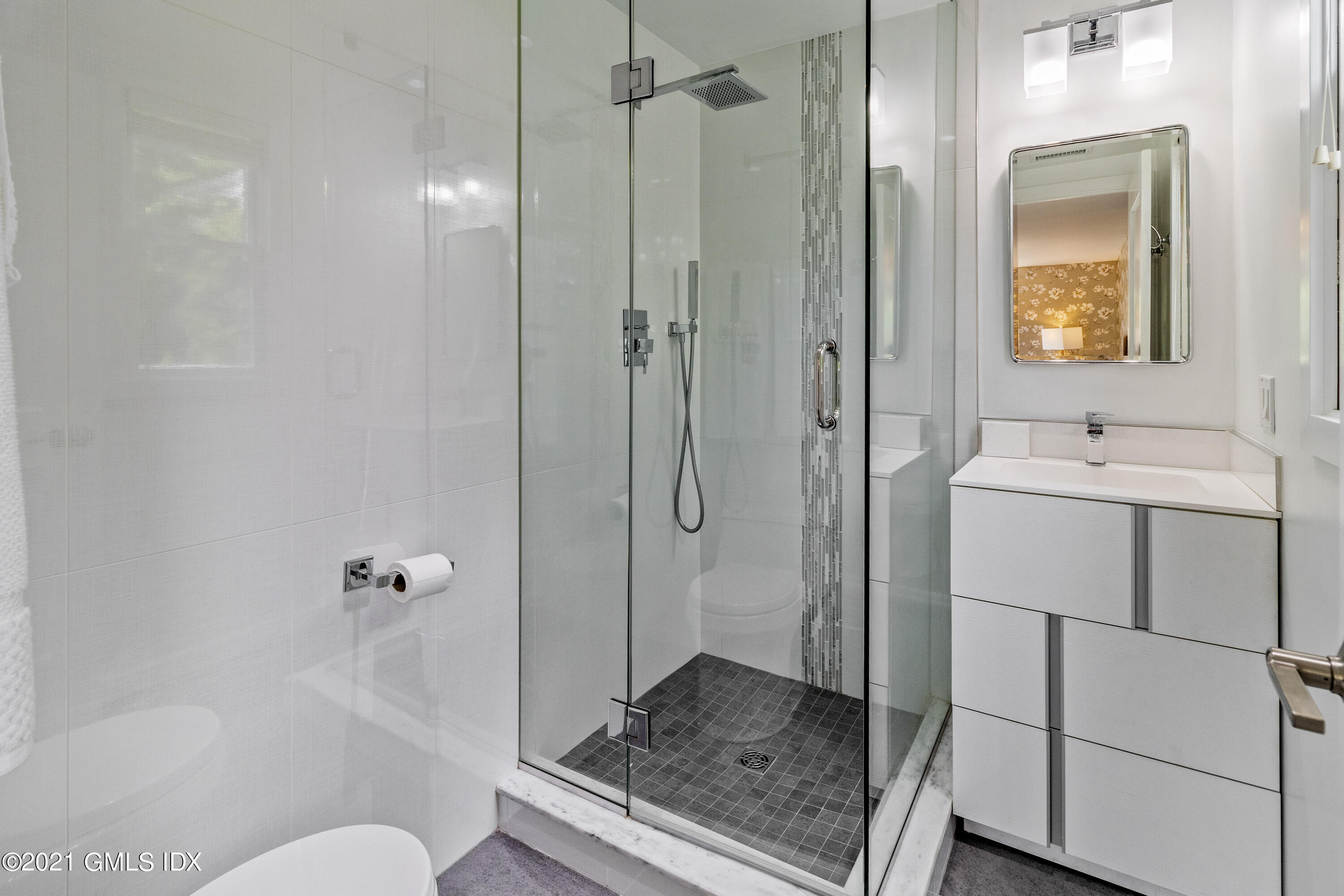 316 Valley Road Cos Cob, CT 06807 - Photo 17 of 25 a bathroom with a granite countertop sink toilet and shower