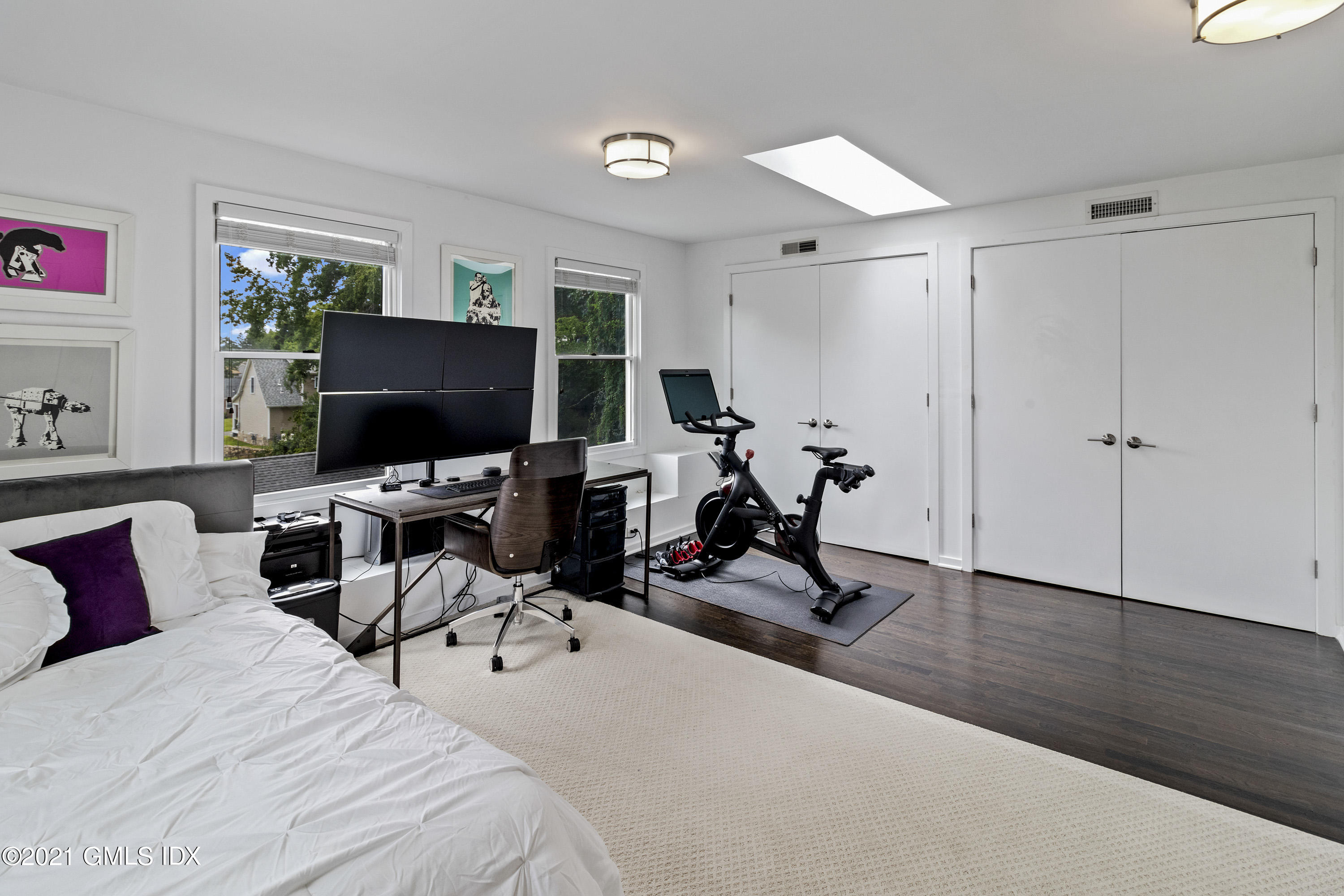 316 Valley Road Cos Cob, CT 06807 - Photo 20 of 25 a bedroom with bed a computer on the desk and a large window