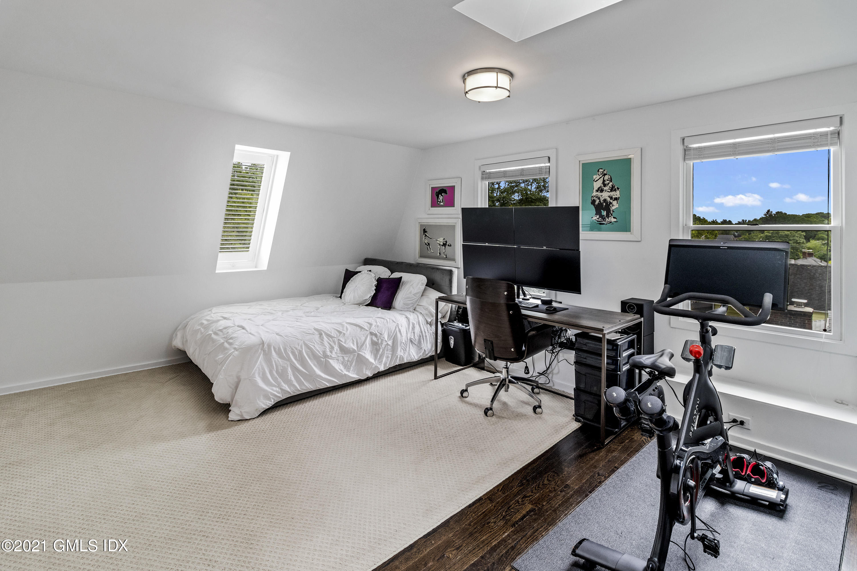 316 Valley Road Cos Cob, CT 06807 - Photo 21 of 25 a bedroom with a bed and a window