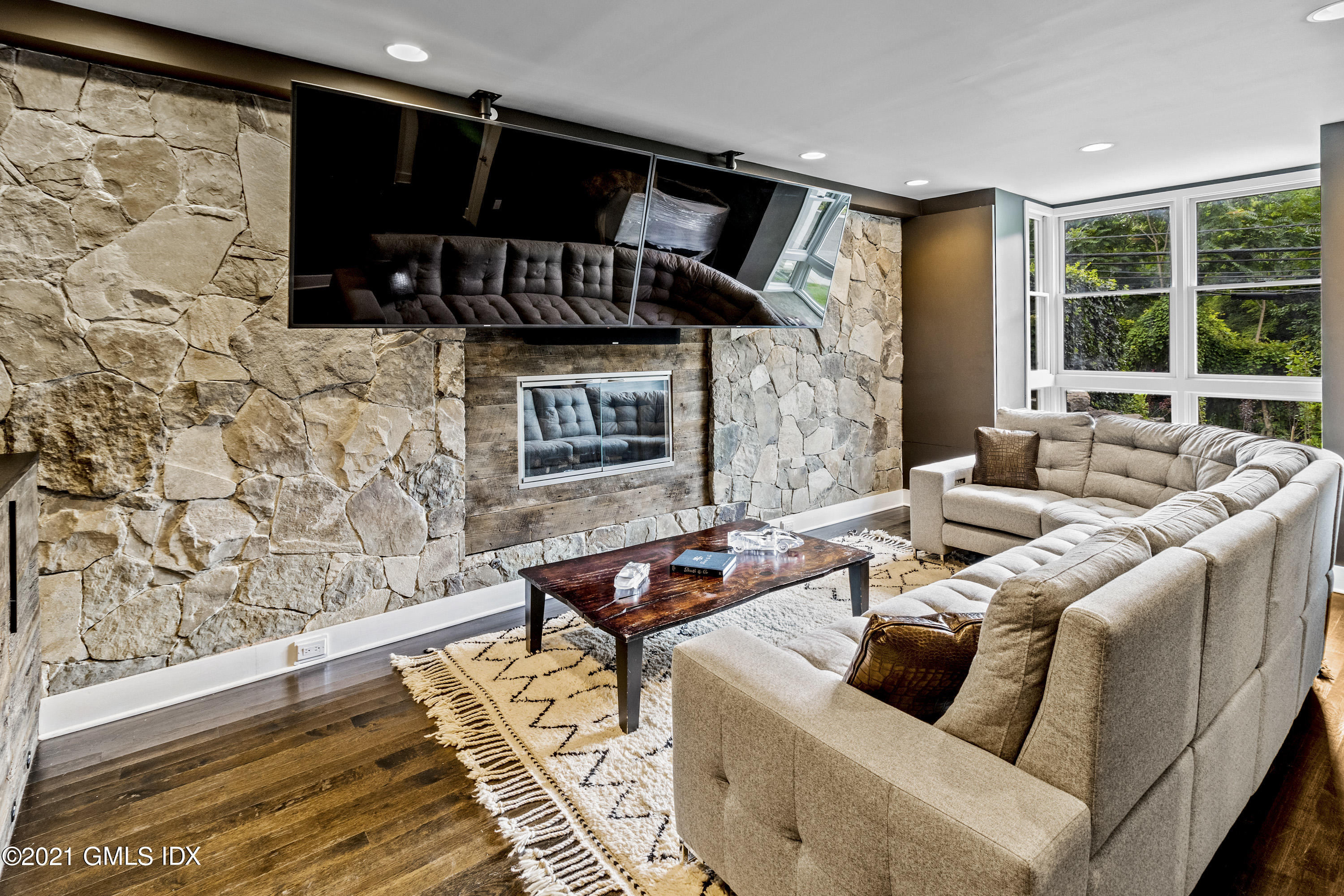 316 Valley Road Cos Cob, CT 06807 - Photo 4 of 25 a living room with furniture and a rug