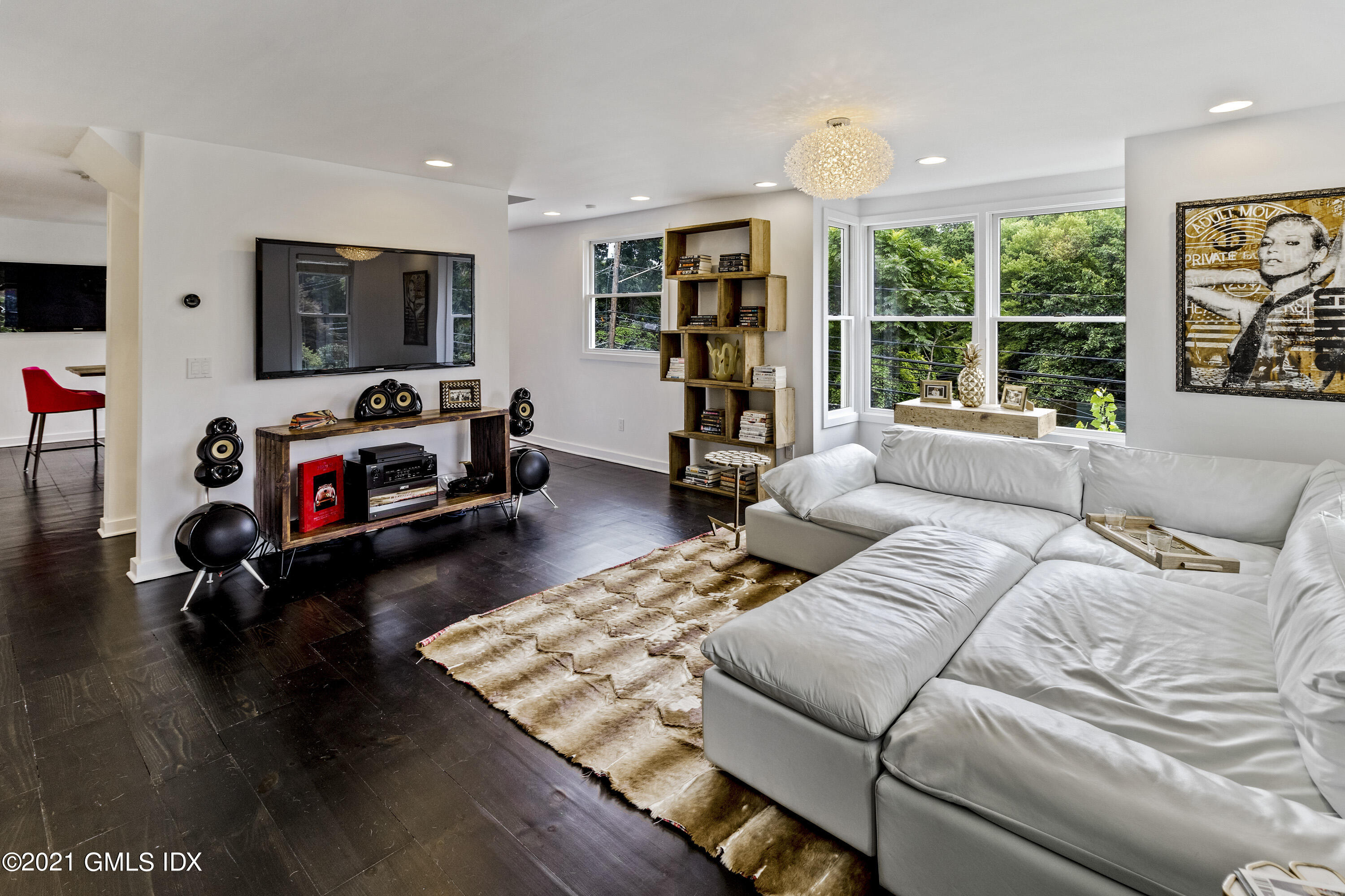 316 Valley Road Cos Cob, CT 06807 - Photo 9 of 25 a living room with furniture and a flat screen tv
