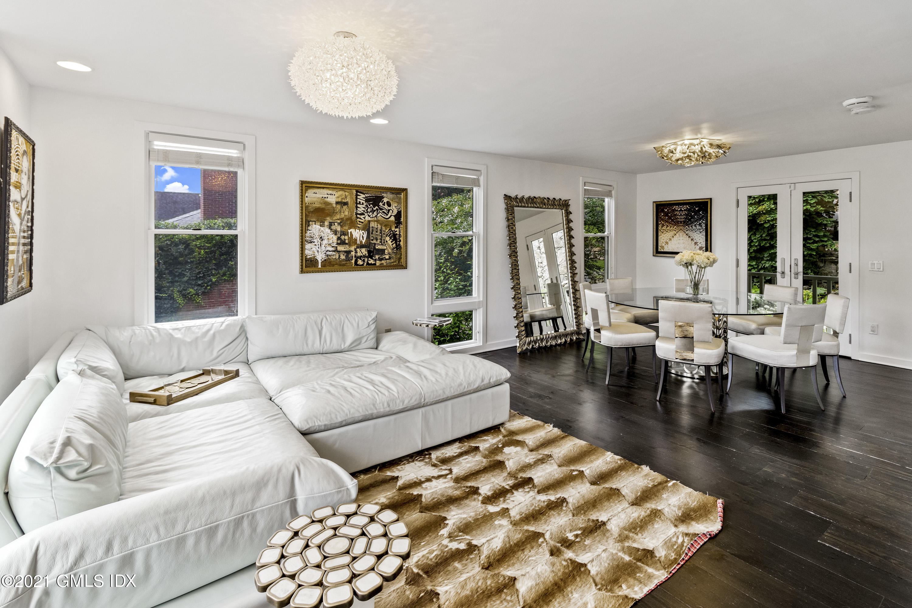 316 Valley Road Cos Cob, CT 06807 - Photo 10 of 25 a living room with furniture and a large window