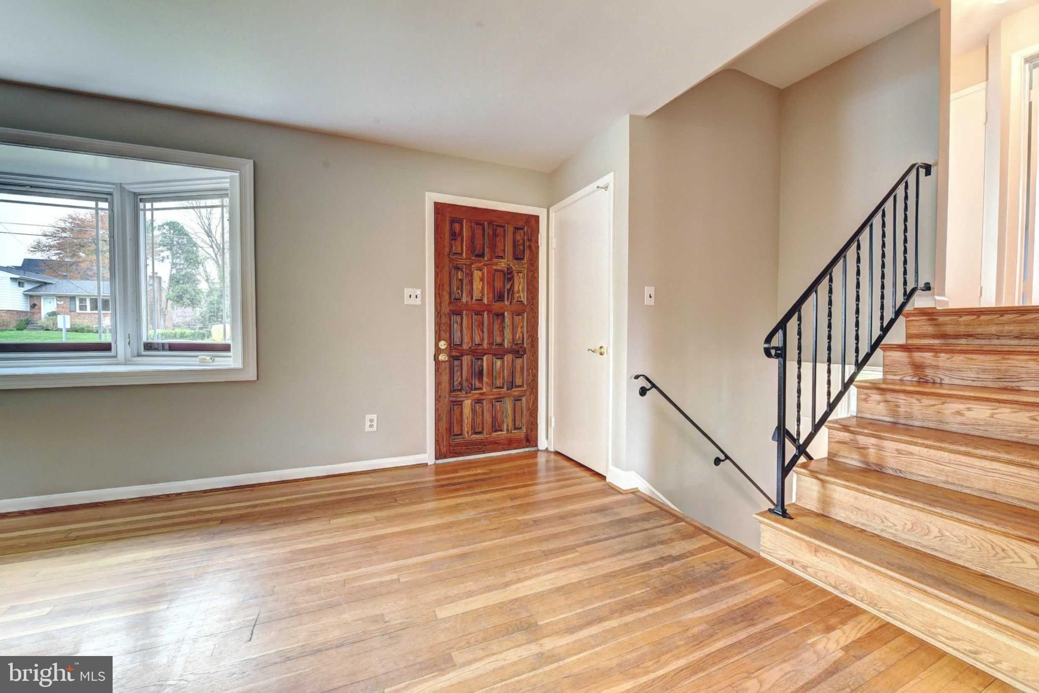 7014 Sea Cliff Road McLean, VA 22101 - Photo 7 of 31 Front door w/ split stairs to family room/bedrooms