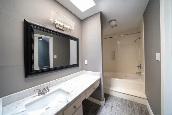 an aerial view of residential house with outdoor space