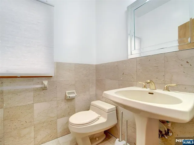 a bathroom with a sink and a toilet