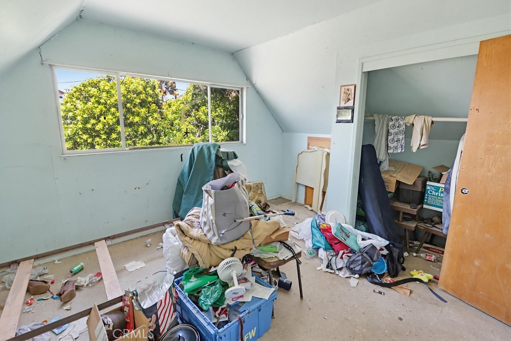 736 Sacramento Avenue Spring Valley, CA 91977 - Photo 19 of 33 a room with furniture and a large window
