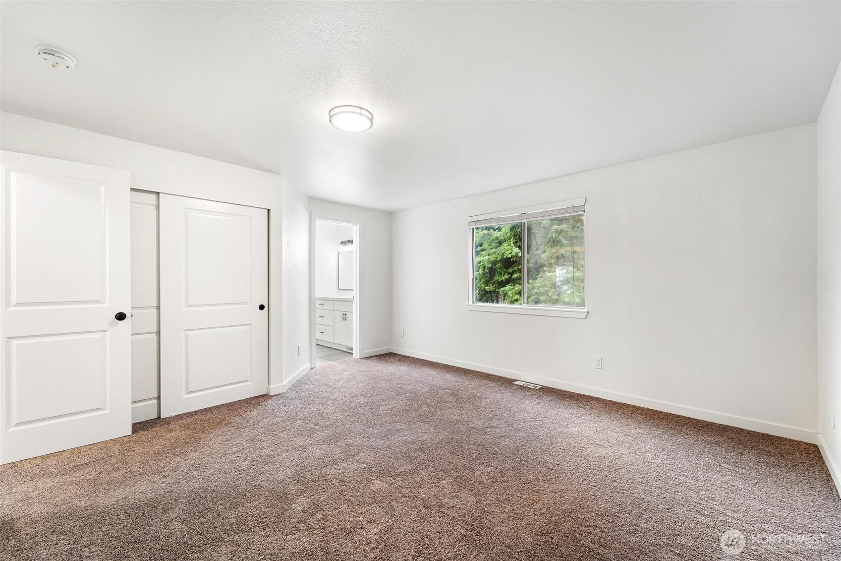 604 213th Street Southwest Bothell, WA 98021 - Photo 27 of 40 an empty room with windows