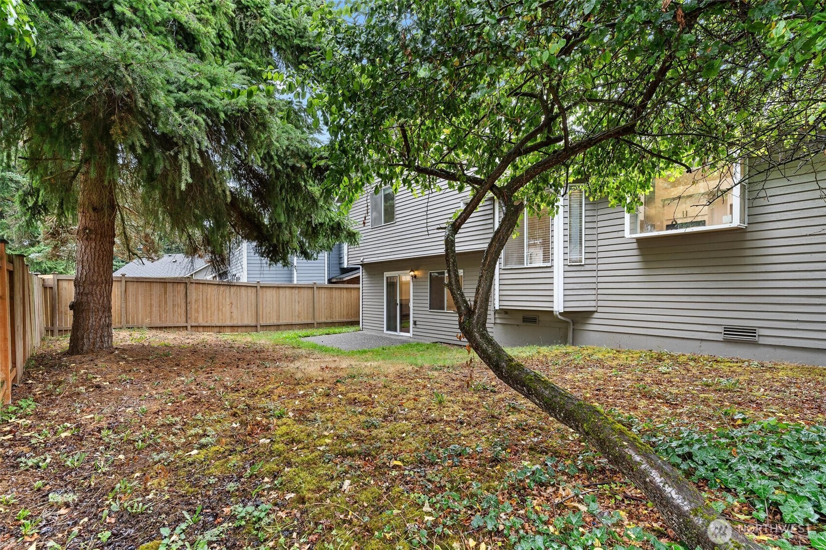 604 213th Street Southwest Bothell, WA 98021 - Photo 35 of 40 a view of a house with a yard and large tree