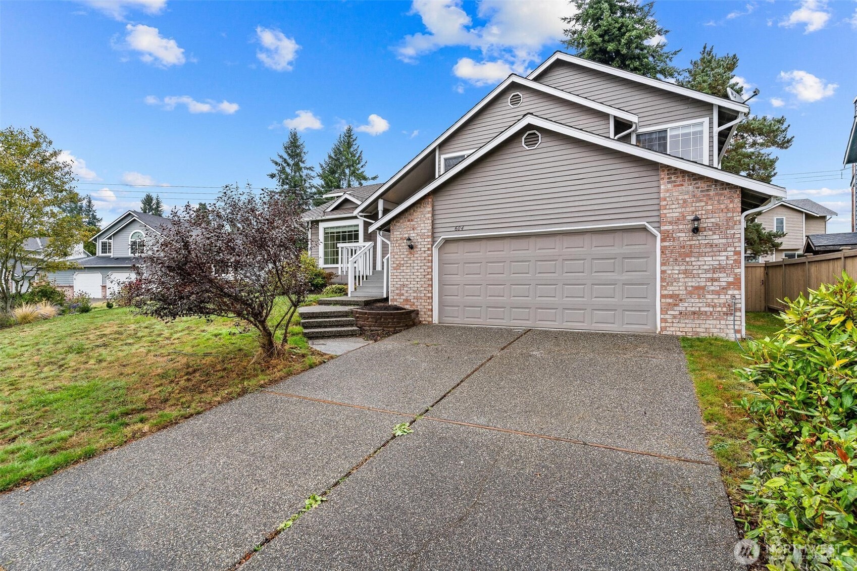 604 213th Street Southwest Bothell, WA 98021 - Photo 5 of 40 a view of a house with a yard