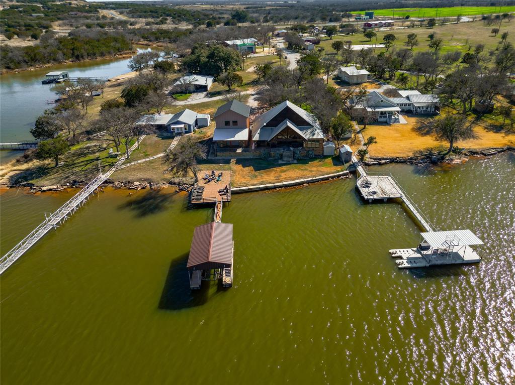 109 Breding Road Graford, TX 76449 - Photo 1 of 1 an aerial view of a house with a ocean view