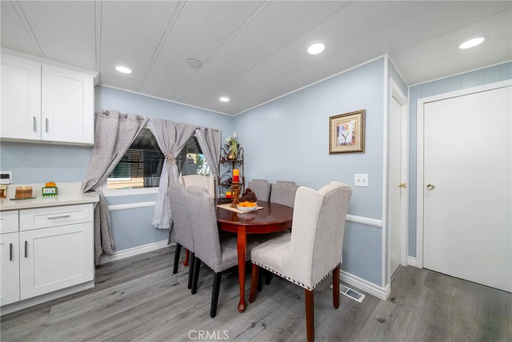 4000 Pierce Street, Unit 58 Riverside, CA 92505 - Photo 12 of 32 a dining room with furniture and window