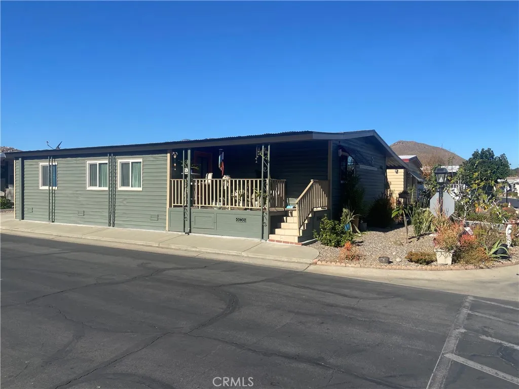 4000 Pierce Street, Unit 58 Riverside, CA 92505 - Photo 2 of 32 a view of a house with a yard