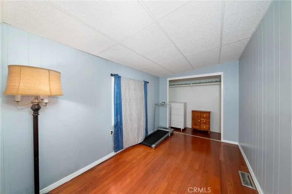 4000 Pierce Street, Unit 58 Riverside, CA 92505 - Photo 23 of 32 a view of a room with wooden floor pool and windows