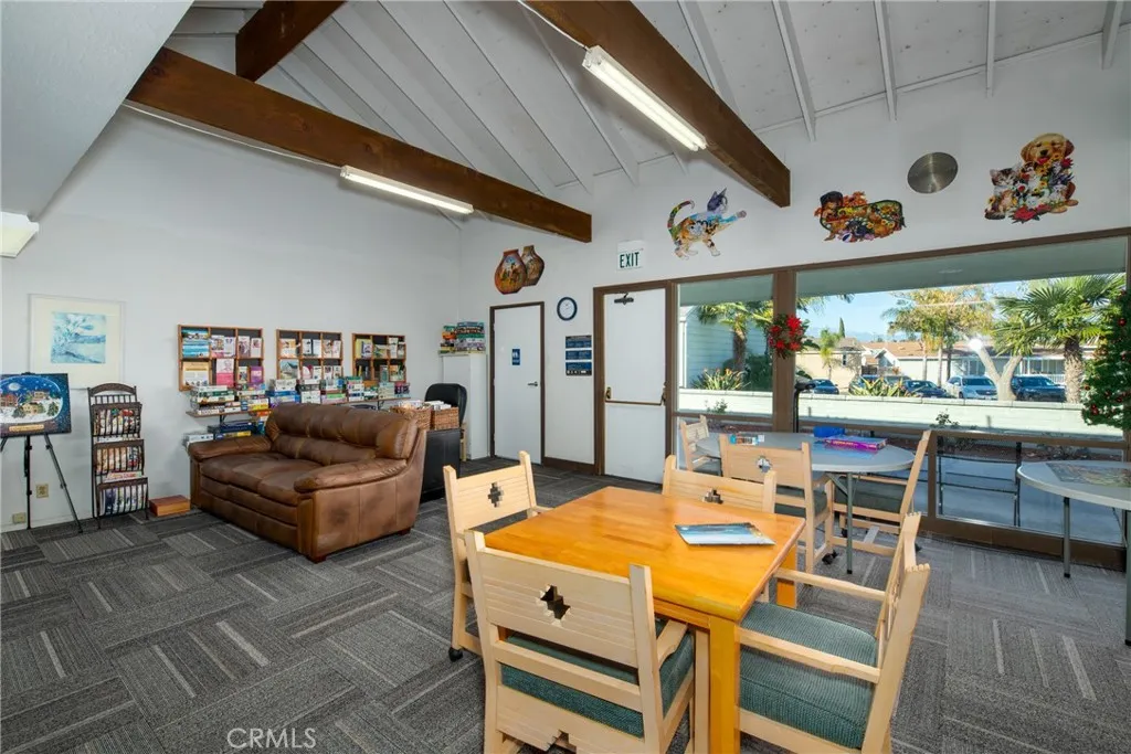 4000 Pierce Street, Unit 58 Riverside, CA 92505 - Photo 29 of 32 a living room with furniture and wooden floor