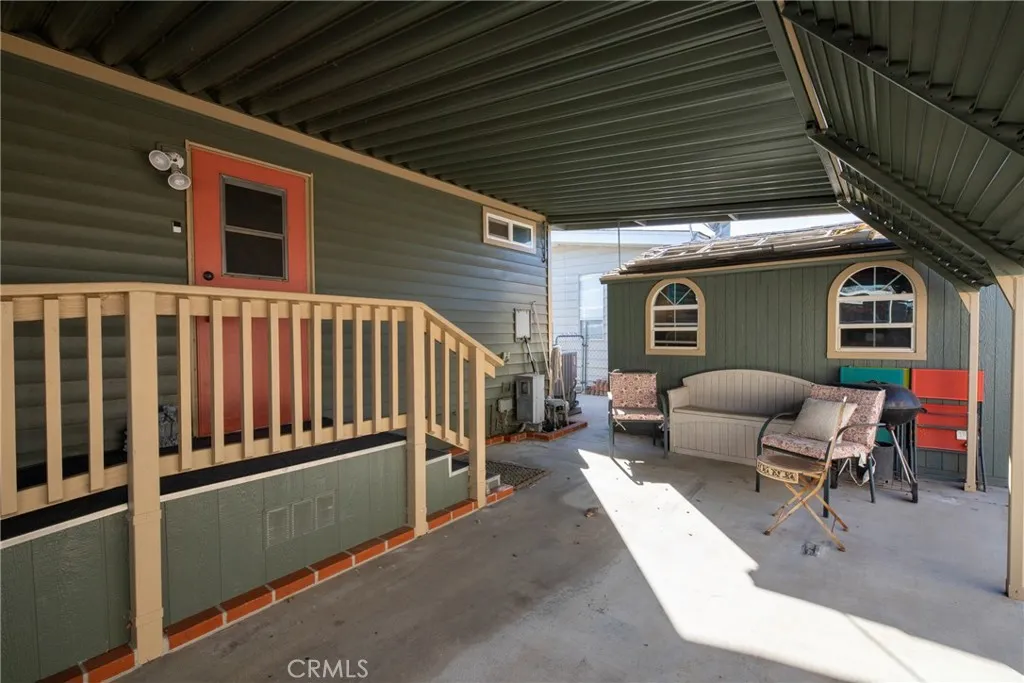 4000 Pierce Street, Unit 58 Riverside, CA 92505 - Photo 5 of 32 a view of a chairs and table in the balcony